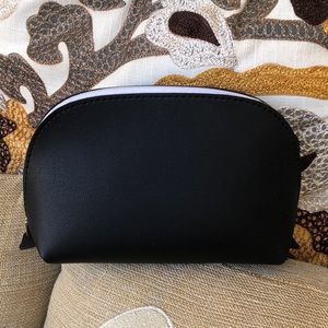 Asks Fifth Avenue United Airlines makeup bag